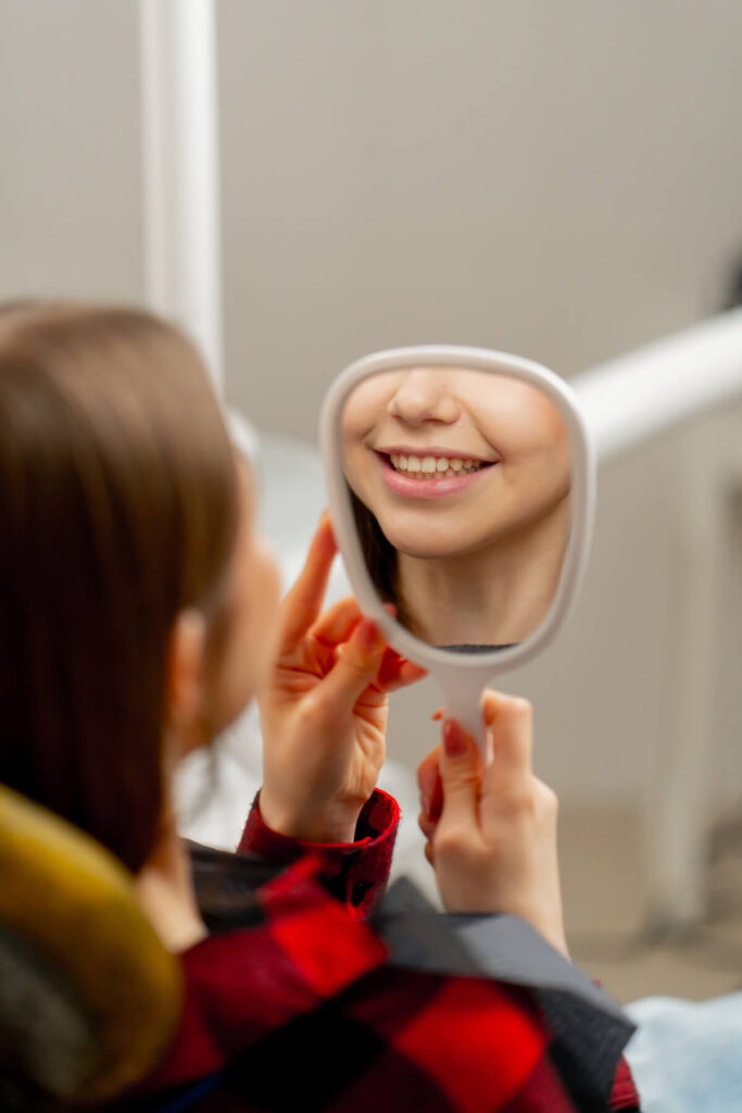 Dental office a young girl  - Oral Plastic Surgery & Periodontics