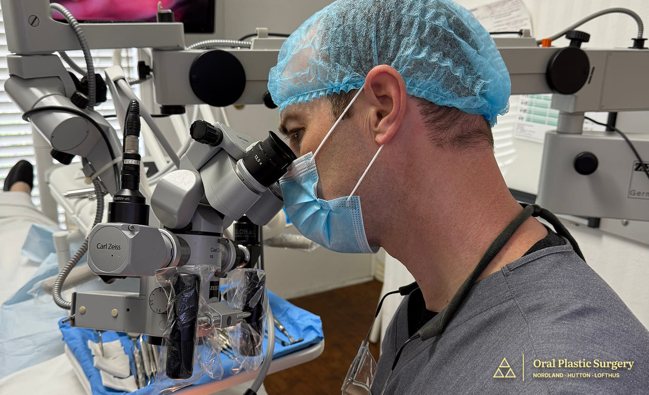 Dr. Hutton performing minimally invasive microsurgery under high magnification to ensure precision and patient comfort